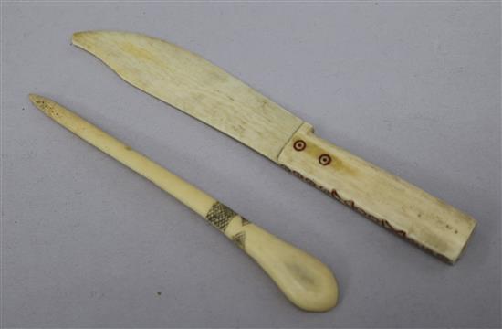 An Zulu bone snuff spoon, and a Inuit bone knife